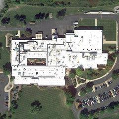 Aerial satellite view of a Bellefonte, PA manufacturing plant roof prior to Safety Rail Source guardrail installation.