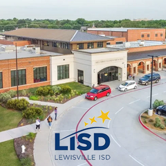 Aerial view of a Lewisville Independent School District (LISD) campus featured in a Safety Rail Source roof hatch safety case study.