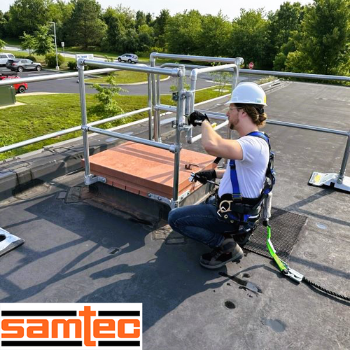 Technician installing Safety Rail Source Kee Hatch Railing fall protection system at Samtec in Royersford, PA.
