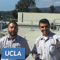 UCLA mechanics on a Los Angeles rooftop following the installation of Safety Rail Source NextGen 3000 Universal Guardrails.