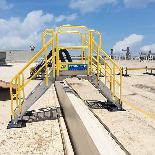 Six-step crossover stairway going over rooftop obstacle.