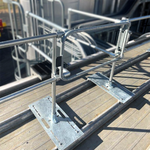 NextGen Continuous Railing™ - Standing Seam - Galvanized - Two Bases Up-Close