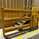 Yellow metal safety barrier on a construction site