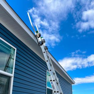 Ladder Safety Step Straight Leaning on Residential Roof