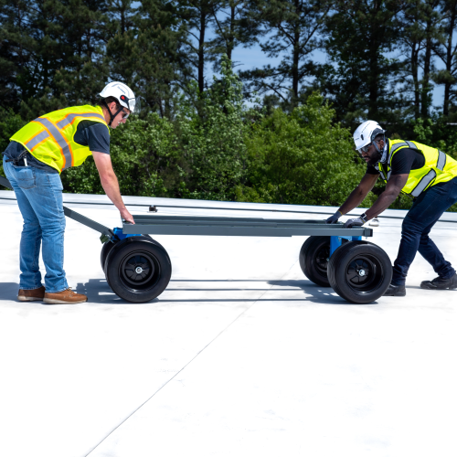 Mobile Fall Protection - Adjustable Roof Cart - Being Moved on Roof