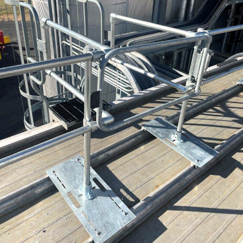 NextGen Continuous Railing - Standing Seam - Galvanized - Two Bases Up-Close