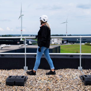 NextGen Mighty-Lite Aluminum Railing - Woman Walking on Roof