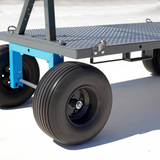 Material cart with large wheels on a white background