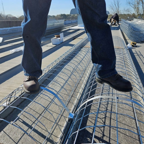 NextGen SSS Standing Seam Skylight Safety-Screen with Man Standing on it
