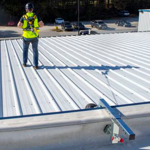 Parapet Roof Anchor with Worker Tied Off