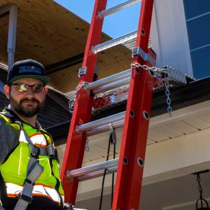 Residential Ladder Safety-Dock with Worker on Ladder